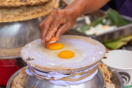 Egg steam on a white cloth steamer; folk wisdom of Thailand.の写真素材