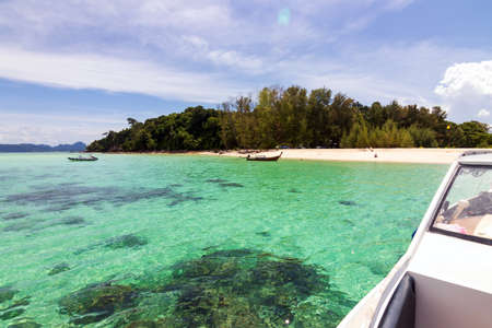 Beautiful white sand beach with blue sky and turquoise sea of Bamboo island or Koh Mai Pai. Phi Phi island national park in Krabi, Thailand.の写真素材