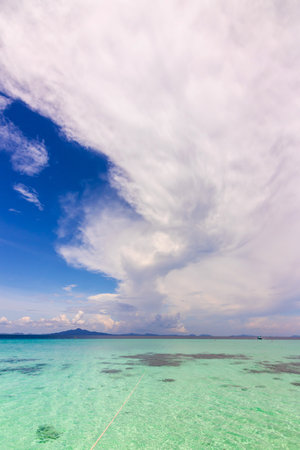 Beautiful white sand beach with blue sky and turquoise sea of Bamboo island or Koh Mai Pai. Phi Phi island national park in Krabi, Thailand.の写真素材