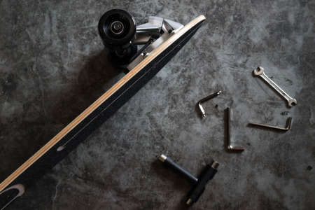 Surf skateboard parts, tools and assembly. Top view of skateboard assembling parts.の写真素材