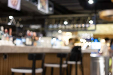 Defocused and blurred image for background of restaurant with bokeh light on background.の写真素材