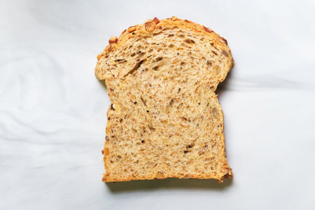 Super grains sliced bread. Health food to reduce high blood pressure, cholesterol and healthy heart. Health food concept with super foods. Top view.の写真素材