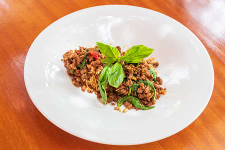 Spaghetti with mince wagyu, chili, dried chili, garlic, olive oil and hot basil.の写真素材
