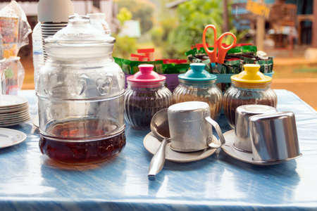 Teapot and cup of tea on the table, stock photoの写真素材