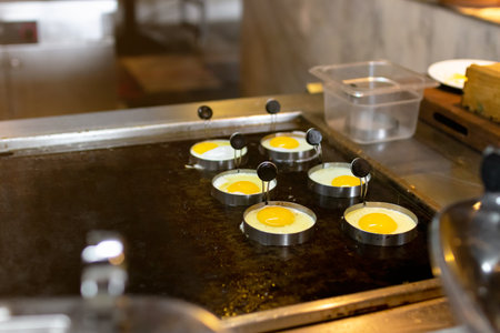 Eggs station at buffet breakfast; cook perfectly moist and delicious eggs.の写真素材