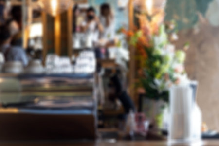 Defocused and blurred image for background of restaurant with bokeh light on background.の写真素材