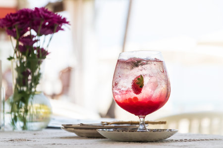 Summer mojito with strawberries. Refreshing summer drink with copy space.の写真素材