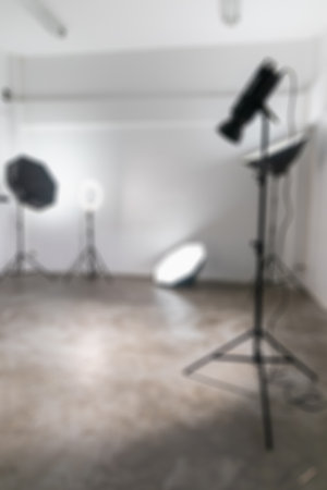 Blurred image for background of studio photo with lighting equipment.の写真素材