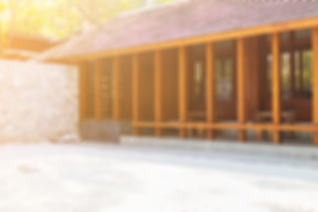 Blurred image for background of japanese wooden building with zen garden style.の写真素材