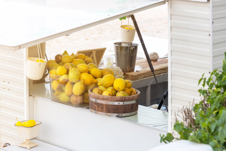 White wooden lemonade stand on the summer beach.の写真素材