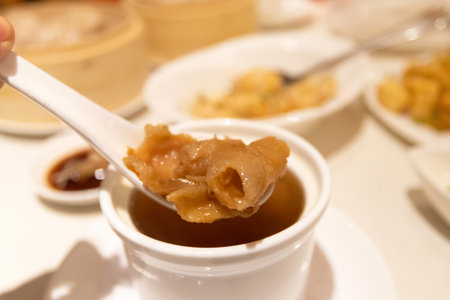 deep-fried pork dumpling with sweet and sour sauceの写真素材