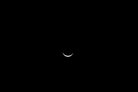 Crescent moon on night sky. Look like a beautiful smile.の写真素材