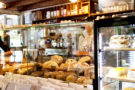 Blurred image for background of bread showcase in a bakery house.の写真素材