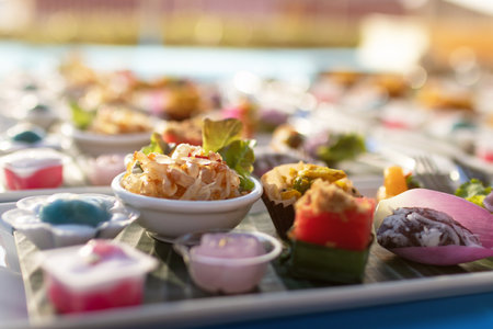 A variety of traditional Thai desserts and snacks serving on banana leaf. Royal Thai cuisine.の写真素材