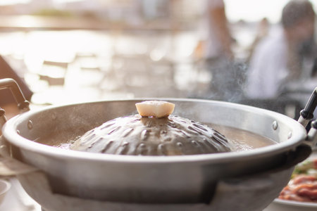 Grill barbecue on pan and hot pot street buffet thai style. (Moo Kra Ta)