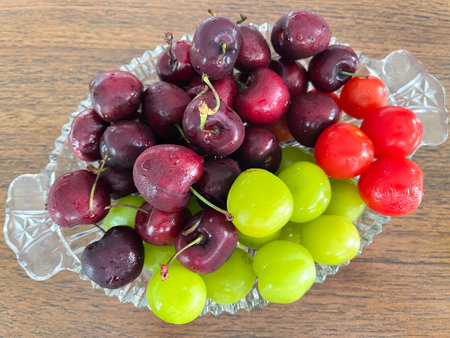 Cherry, green grape and cherry tomatoes mix fruit and max vitamins.の写真素材