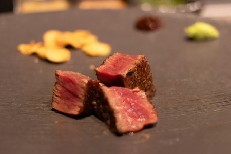 Delicious gourmet steak slices on a plate.の写真素材