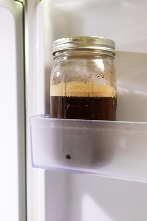 Coffee in the fridge. For the best taste, cold brew coffee should be stored in an airtight container in the refrigerator for up to 2 weeks.の写真素材