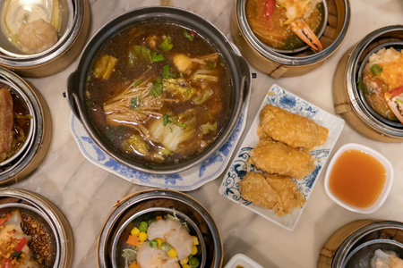 A vibrant display of various delicious dishes in traditional serving containers.