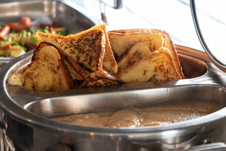 Delicious golden-brown French toast slices.の写真素材