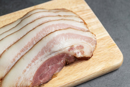 Uncured bacon made from pork belly.の写真素材