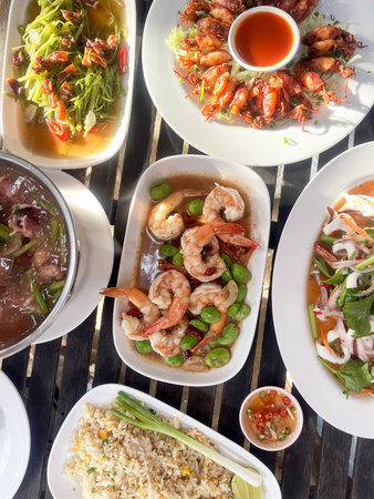 A shrimp stir fry shrimp petai prawn seafood spicy sauce fried rice salad garlic chili