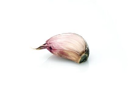 garlic isolated on whiteの写真素材