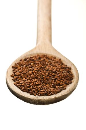 wooden spoon with cress seeds isolated on white backgroundの写真素材