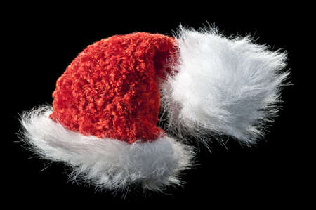 santa hat isolated on black backgroundの写真素材
