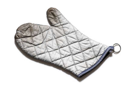 used oven mitt isolated on white backgroundの写真素材