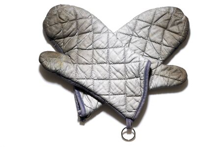 pair oven mitts on white backgroundの写真素材