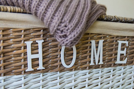 wattled box with wool pullover and title homeの写真素材