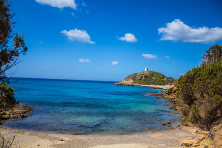 Sardinia Italy Torre de Chia bay with blue sky