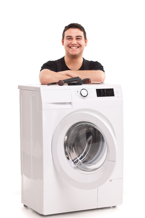 studio photo of washing machine repairmanの写真素材