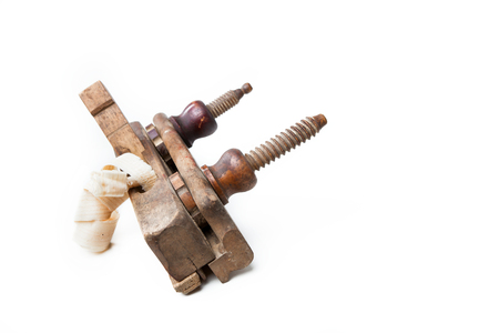 planer with wooden chips, wood shavings isolated on white background