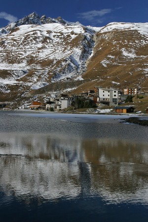 The lake and the village of Tignes in french alps