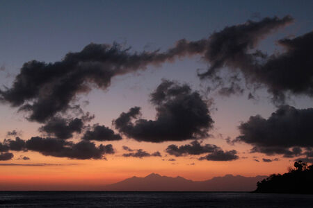 Sunrise on Lumbock island from Bali beachesの写真素材