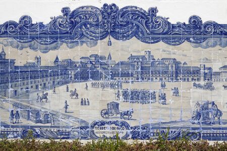 LISBON, Portugal, April 5, 2017 : Praca do Commercio landscape on Azulejos of St Luzia church. Azulejos are Portuguese painted tin-glazed ceramic tilework, found on the interior and exterior of churches and palaces.のeditorial素材