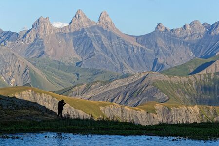 Sunset on the Aiguilles d'Arves peaks over the Guichard Lake