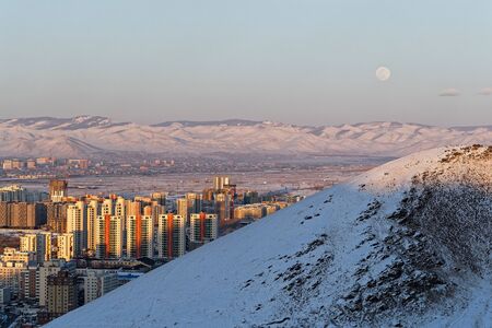 Ulaan Baatar buildings of city center at sunset lightの写真素材