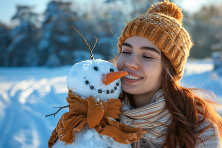 Smiling Young Woman Building Snowman in Winter Wonderland, Joyful Seasonal Outdoor Activity Concept AI Generativeの素材
