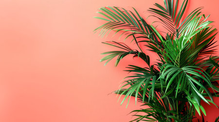 Vibrant Tropical Palm Leaves on a Pastel Coral Background for Fresh Summer Design Concepts AI Generativeの素材