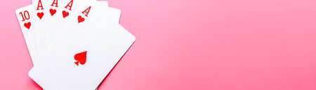 Vibrant Pink Background with Playing Cards in a Fan Arrangement Showing Ace of Hearts and More AI Generativeの素材