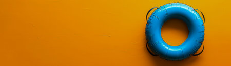 Bright Orange Background with Single Blue Lifebuoy Minimalistic Nautical Safety Equipment Concept and Vibrant Color Contrast AI Generativeの素材