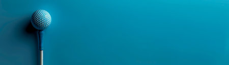 Minimalist Close Up of Golf Ball on Teal Background with Space for Text, High Contrast and Clean Design for Sports Concept or Recreational Activity Promotion AI Generativeの素材