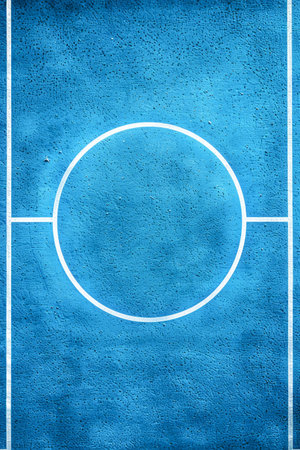 Aerial View of Blue Outdoor Sports Court with Central Circle and White Lines in Geometric Pattern AI Generativeの素材