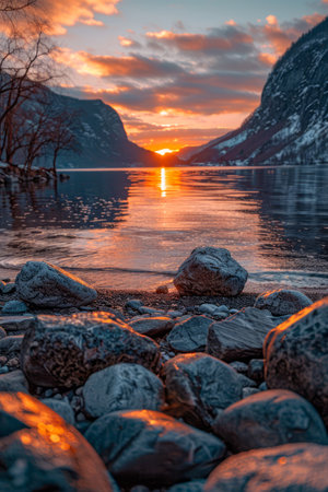 Immerse yourself in the ethereal beauty of a mountain sunset reflected on a tranquil lake The rugged shoreline frames the vibrant colors of nature, while dramatic clouds paint the sky with a captivating tableau The serene atmosphere invites a sense of peace and tranquility, making it an unforgettable evening landscape capture AI Generativeの素材