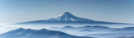 A serene mountain landscape unfolds before you, its snow-capped peak piercing the sky Misty layers of hills stretch out in tranquil harmony, creating a sense of depth and ethereal beauty The clear sky, painted in soft blue tones, enhances the majesty of nature, capturing its serene and awe-inspiring essence AI Generativeの素材