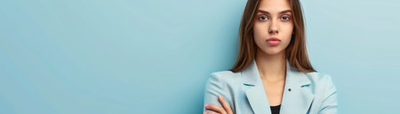 Capture the confidence and professionalism of a young woman in a striking blue blazer against a light blue backdrop A vibrant portrait that exudes leadership, ambition, and a contemporary style Perfect for business branding, personal branding, and empowering career-oriented content AI Generativeの素材