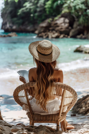 A woman basks in the warm sun on a pristine beach, completely engrossed in a book The azure ocean stretches out before her, creating a breathtaking vista  Gentle waves lap at the shore, and the sound of seagulls fills the air,  evoking a sense of serenity and tranquility This picturesque scene captures the essence of a perfect summer day AI Generativeの素材